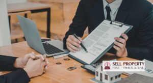 Couple in Dubai discussing sale of jointly owned property during divorce with an advisor